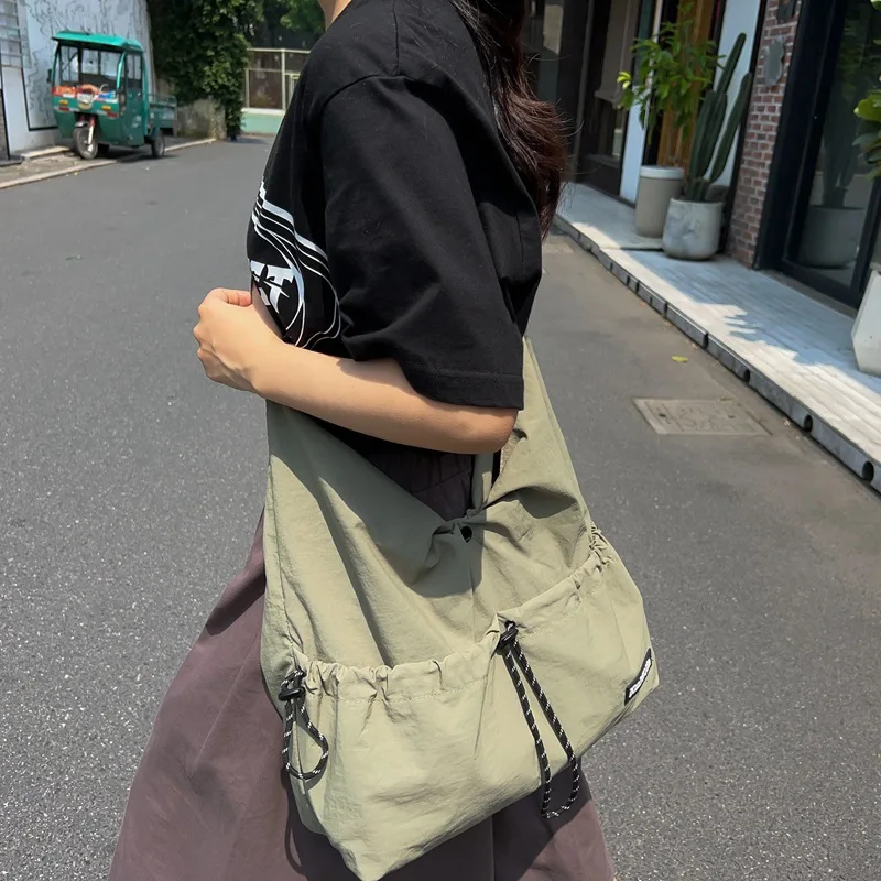 

Japanese Style Lightweight Crossbody Waterproof Unisex Shoulder Bag Drawstring Portable Workbag Student Versatile Backpacks