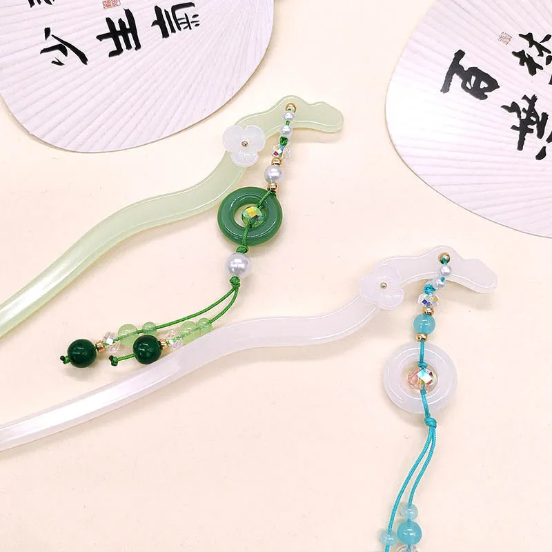 

High-end and niche tassels, jade hairpins, horse face dresses, versatile walking accessories and headwear, coiled hairpins
