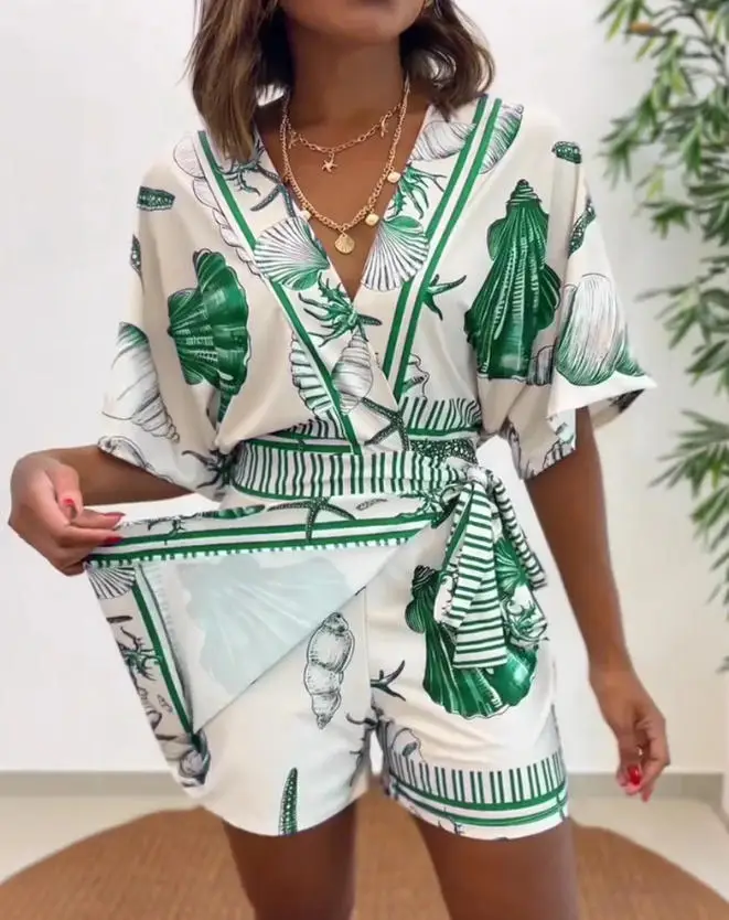 

Летний новый элегантный повседневный комбинезон для отпуска с принтом в виде ракушек, V-образным вырезом, завязками на талии, утягивающий, с рукавами до локтя, женский.