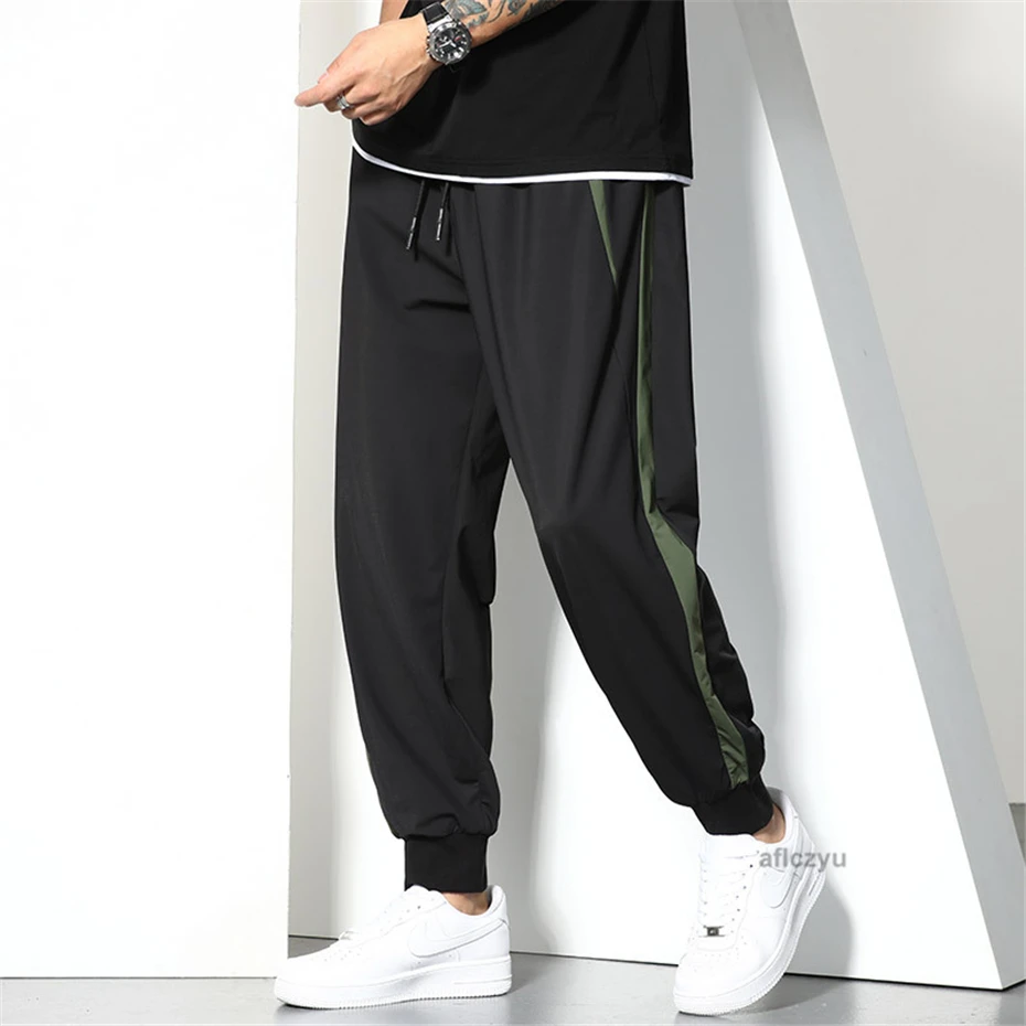 Schwarze Jogger hose Männer Sommer Baggy Hose plus Größe 6xl Mode lässig Patchwork Hose männlich unten groß 6xl