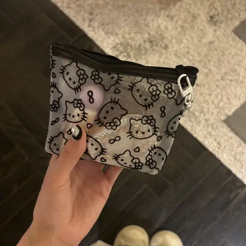 New 2025 Sanrio Hello Kitty Mesh Material Storage Bag Portable Zipper Coin Purse Creative Earphone Bag Cute Girls Cosmetic Bag