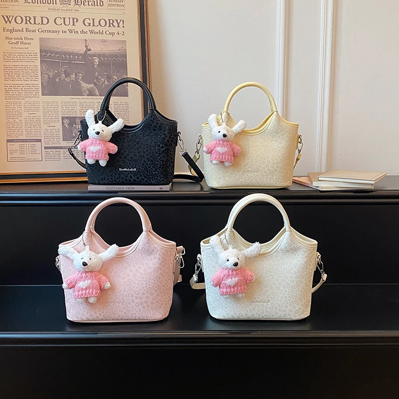 

Leopard Print Mini Tote Bag for Women, Kawaii Plush Bunny Pendant Handbag, 2026 New Fashion Crossbody Bucket Bag