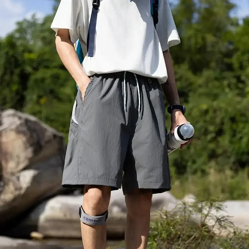 

Мужские летние спортивные шорты 2026: модный бренд, дизайн с цветовыми блоками и пэчворком, быстросохнущие, охлаждающие, свободные, повседневные, до колена