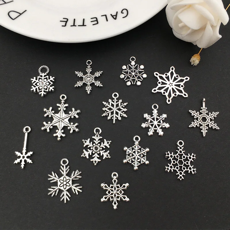 (14Pcs/pack)1cm-2.5cm Mixed Silver Alloy Snowflake Pendant Christmas Decoration Metal Hollowed Out Snowflake Handmade Gift Label