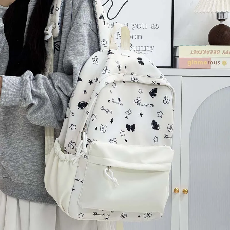 

Back To School Backpack Playful Bow Print Bookbag Quilted Comfort and Multi-Pocket Organization System for Women's Campus Life