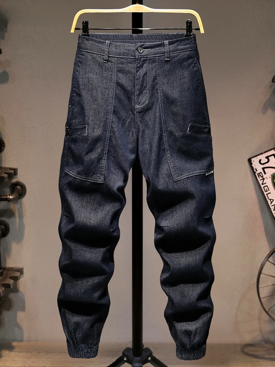 

Новые мужские модные рабочие джинсы 2025 года: свободные, с эластичным поясом, многокарманные, длинные брюки из хлопкового стрейч-денима, молодежный крой.