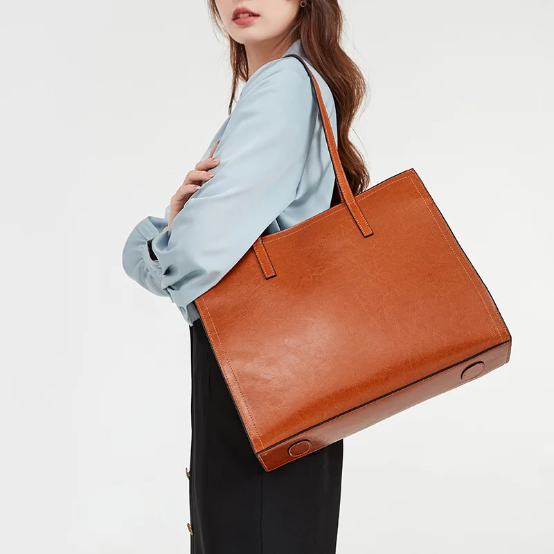 2024 New High Quality Cowhide Tote Bags Women Simple Commuter Large Capacity Soft Handbags Female Minority Ligh Luxury Purses