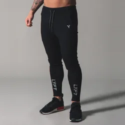 Letnie spodnie do fitnessu męskie jesienno-zimowe nowe oddychające sportowe spodnie Casual Slim-fit wiązane mała stopa spodnie z zamkiem