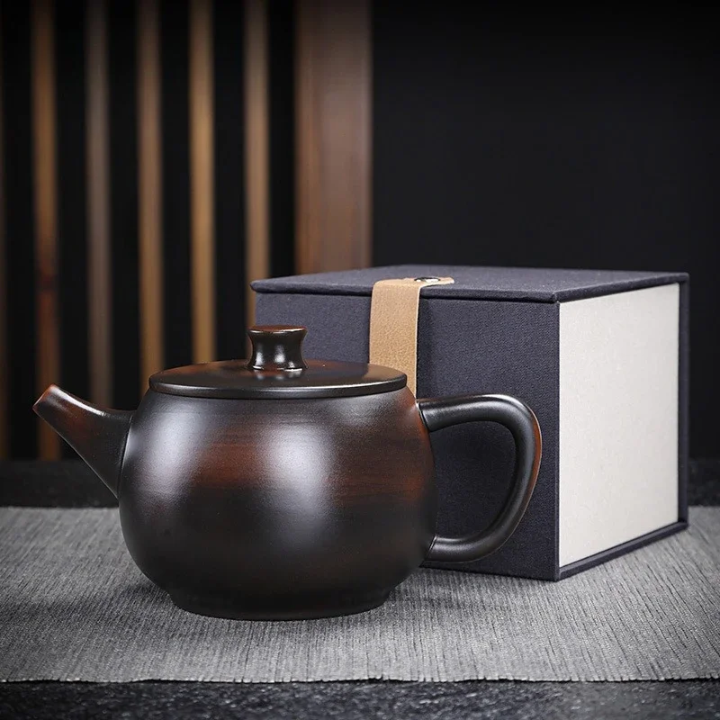 Purple pottery handmade teapot large-capacity ceramic relief pot Kung Fu tea set household purple clay pot ball hole filter