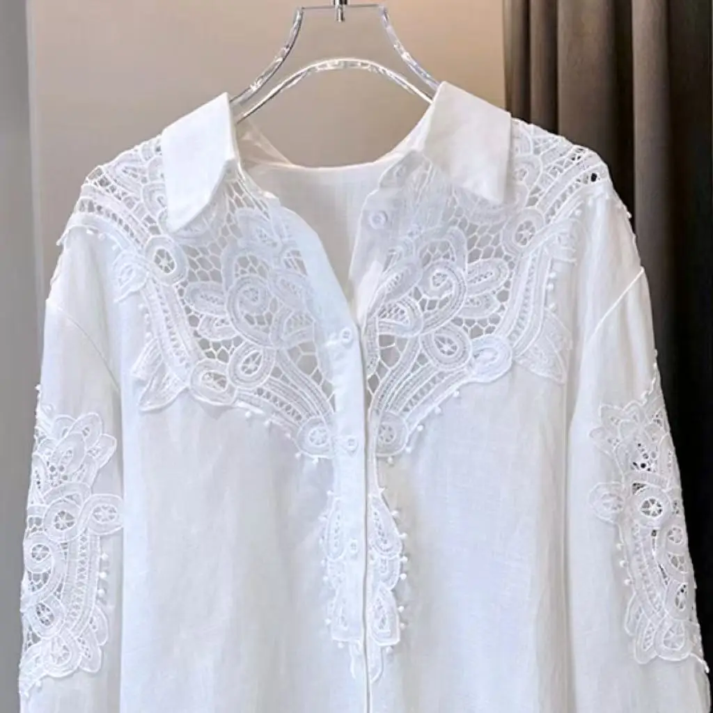 เสื้อเบลาส์ผ้าฝ้ายสีขาวปักเลื่อมฉลุลายแบรนด์หรู ดีไซน์แขนยาวทรงหลวมสไตล์ลำลองสำหรับผู้หญิง แฟชั่นปี 2025