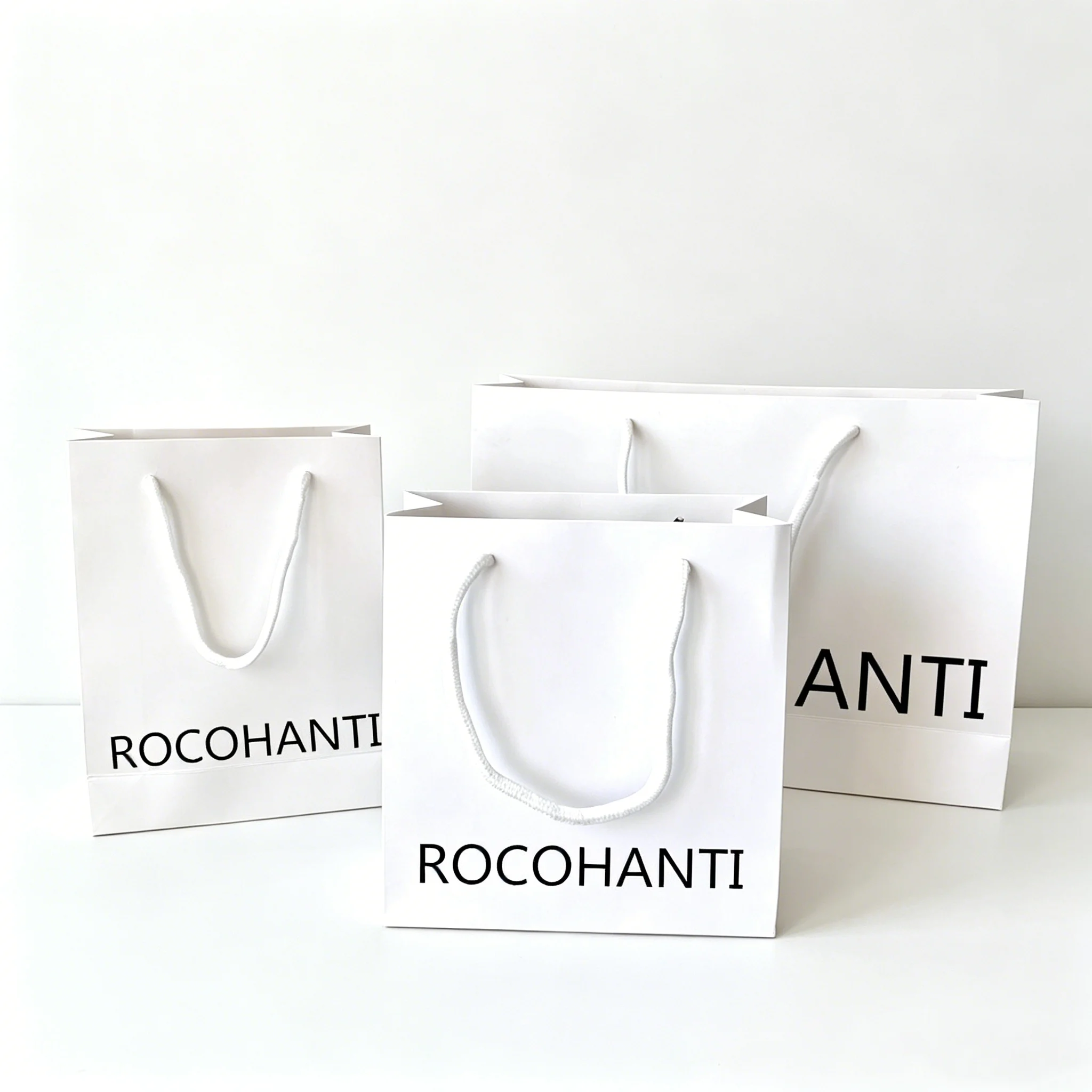50pcs-custom-logo-printed-paper-bags-with-handles-white-gift-shopping-bag-for-boutique-small-business-retail-packaging-supplier