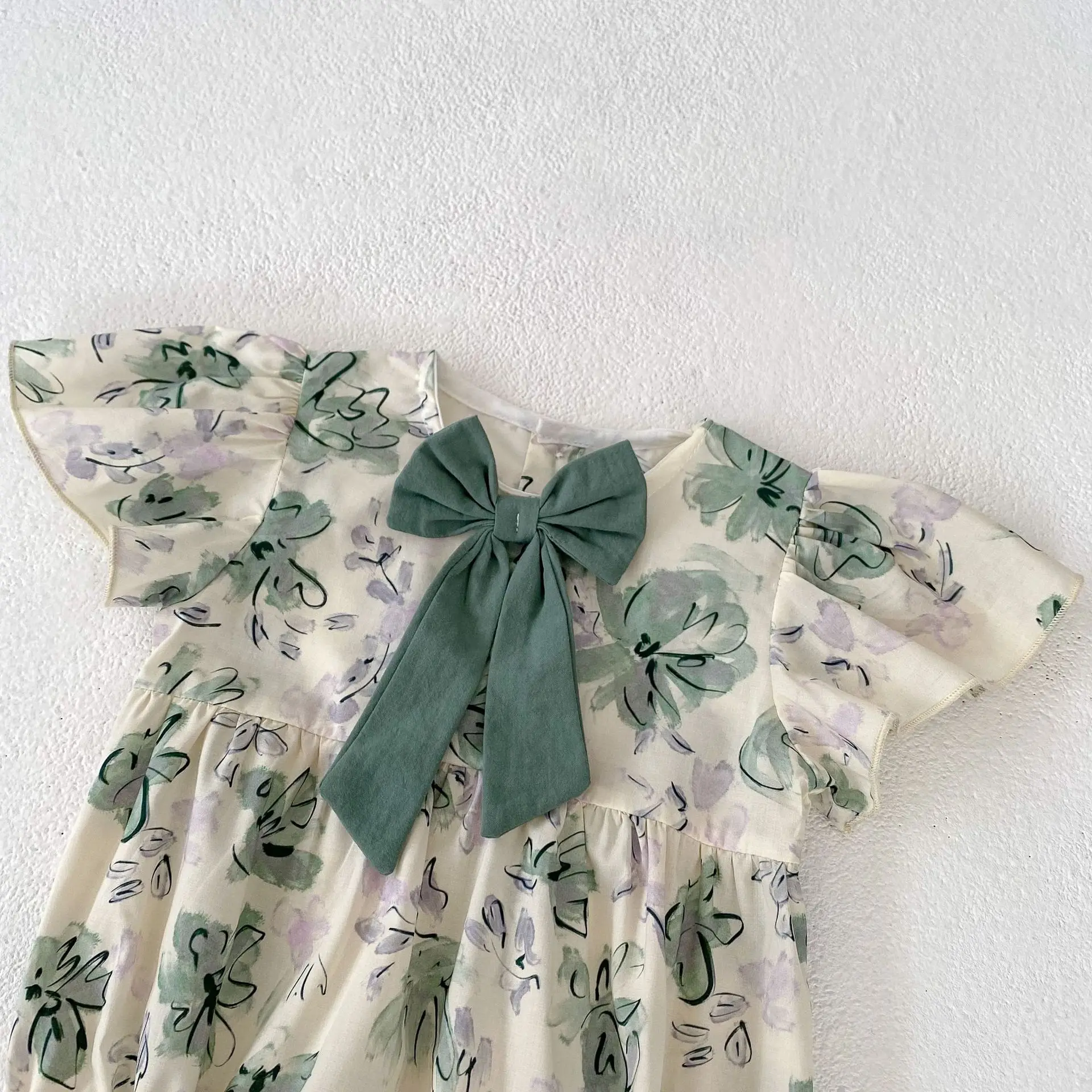 Summer New Fashionable and Cute Baby Girl Printed Bow with Flying Sleeves Sweetheart Triangle jumpsuit