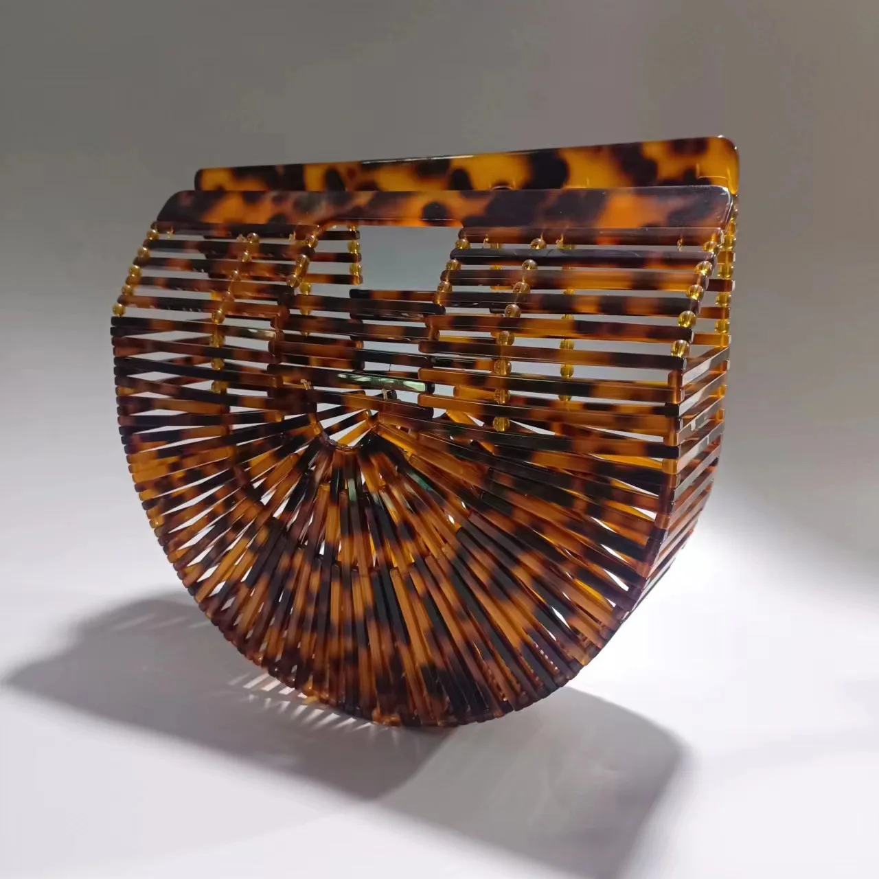 

New Fashionable Amber Basket-shaped Acrylic Handheld Evening Bag for Ladies Ideal for Vacation Beach Party with Hollow Design