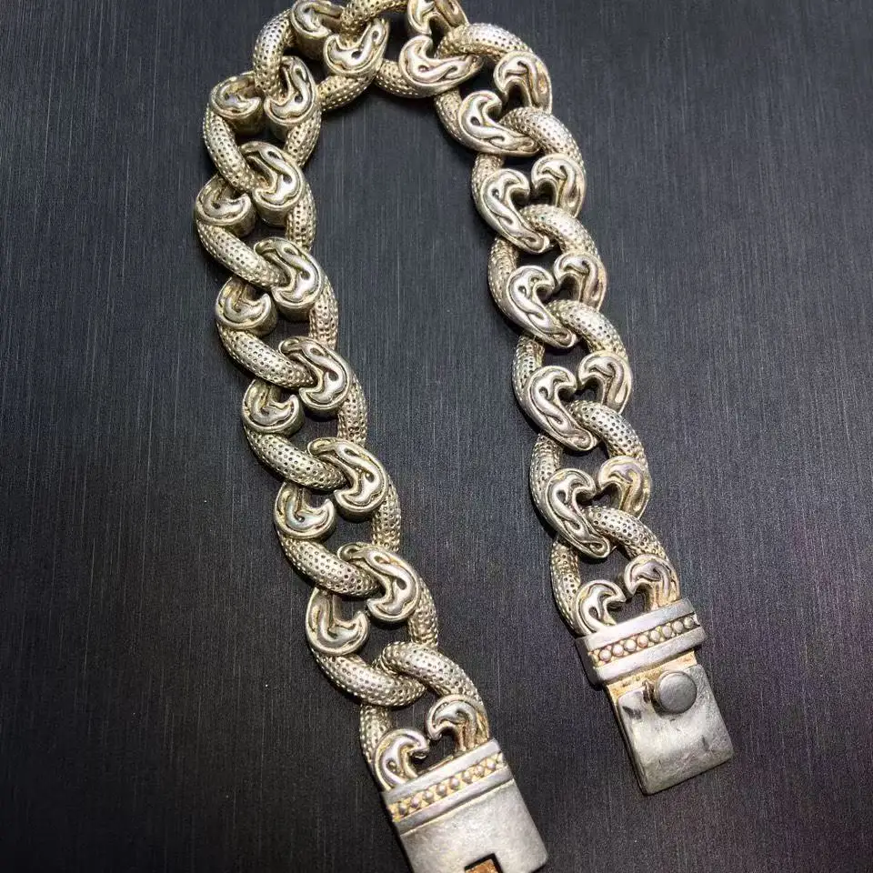 

Vintage Tibetan Silver Bracelet Unique Design Fashion Jewelry Silver Craft Bracelet with Traditional Patterns Showcasing Retro