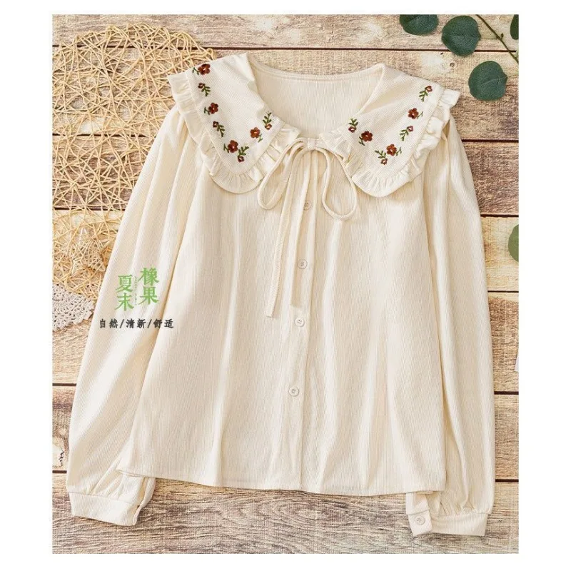 Chemise brodée à col de poupée pour femmes, haut à manches longues en velours côtelé à volants et lacets, nouvelle collection automne et hiver