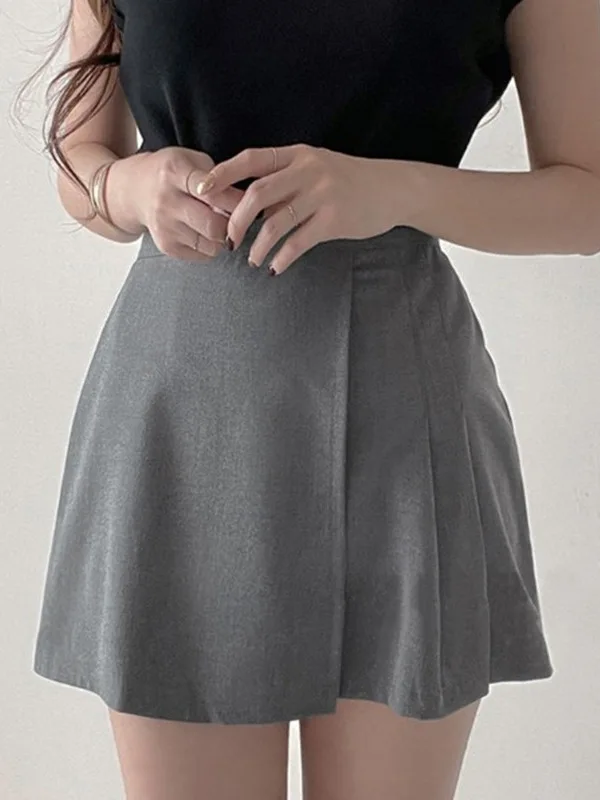 Wiosna/lato wersja koreańska nowa jednolita, wąska plisowana spódnica z wysokim stanem damska kopertowa krótka spódniczka w kształcie litery A D729