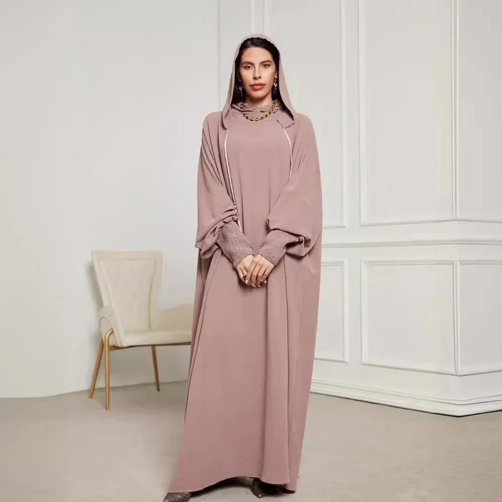 Nouvelle mode musulmane 2025 femmes couleur unie décontracté à la mode élégant à manches longues à capuche Abaya femme Jalabiya vêtements manteau robes