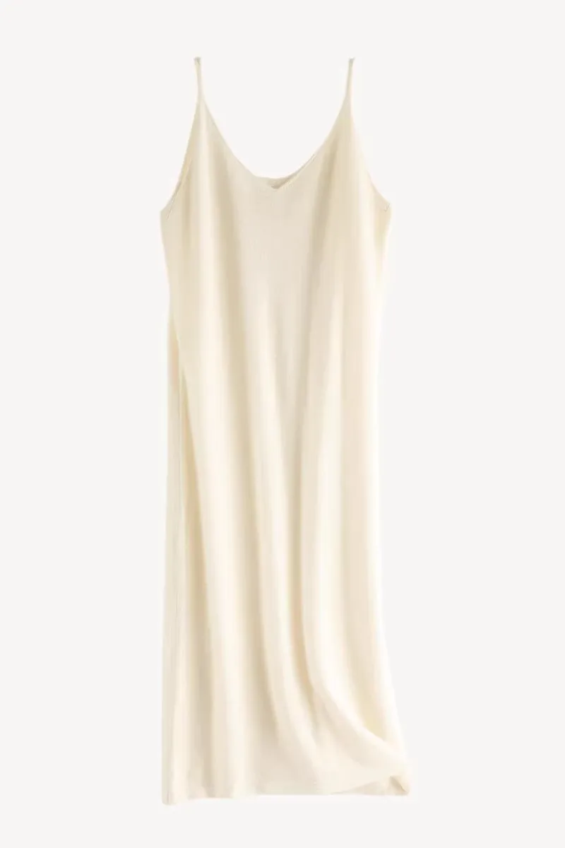 Long over-the-knee suspender dress female V-neck solid color casual 100% pure cashmere knit one-step skirt.