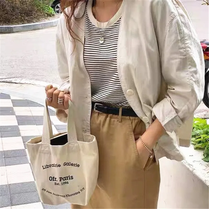 Mini bolso de mano de estilo coreano para mujer, bolsa de compras para Boutique de lona con estampado de letras, bolsa de almuerzo para mujer