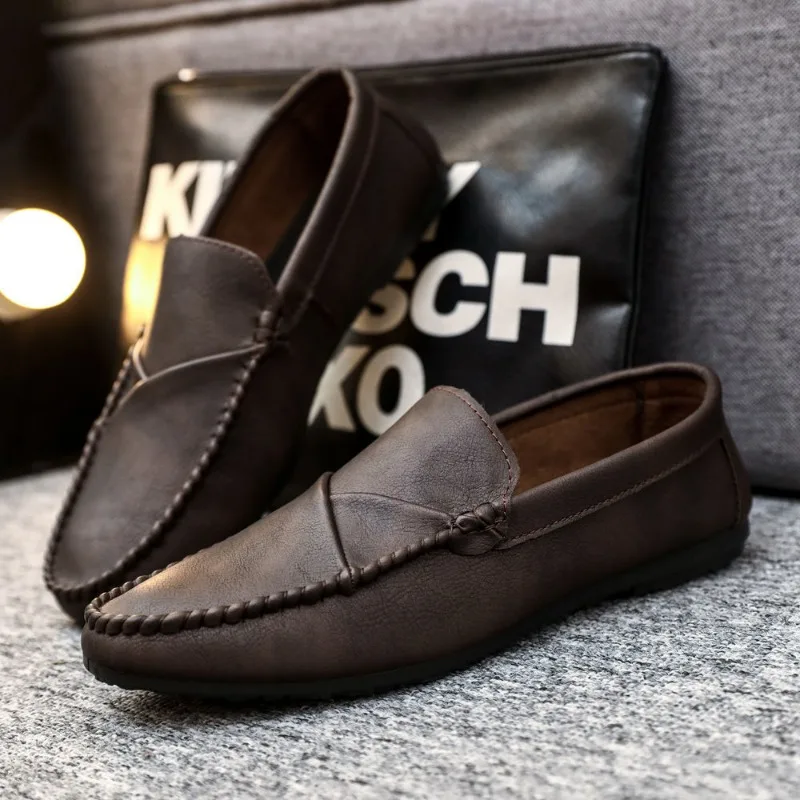 Mocasines de cuero sintético para hombre, zapatos planos de punta redonda, informales, elegantes, a la moda, color negro, 2024