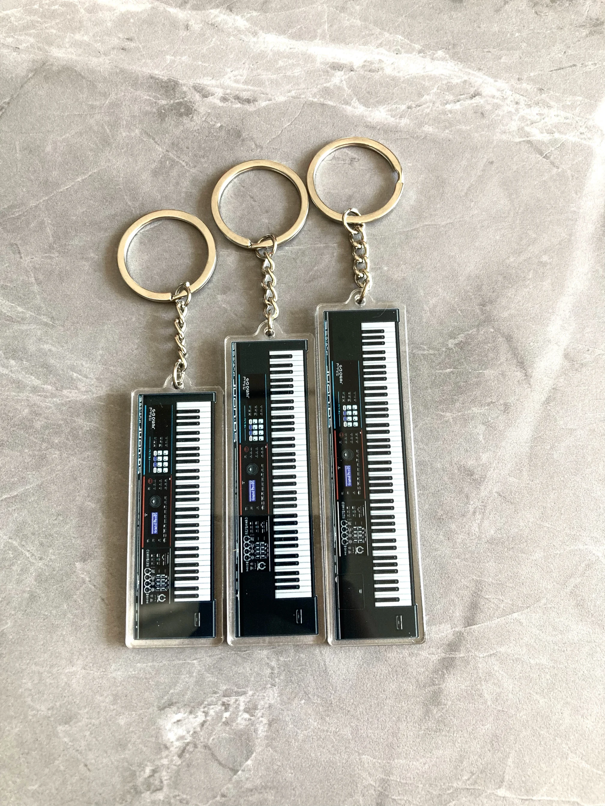 رولاند جونوDS سلسلة بكسل الرياح الاكريليك البيانو الكهربائي قلادة المفاتيح لوحة المفاتيح لاعب إنتاج الموسيقى الطرفية