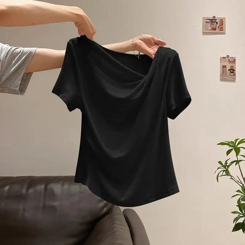 Damska bluzka z odkrytymi ramionami, asymetryczna, dopasowana, z nieregularnymi krótkimi rękawami, nowość na wiosnę i lato 2026, minimalistyczna, uniwersalna bluzka typu pulower.