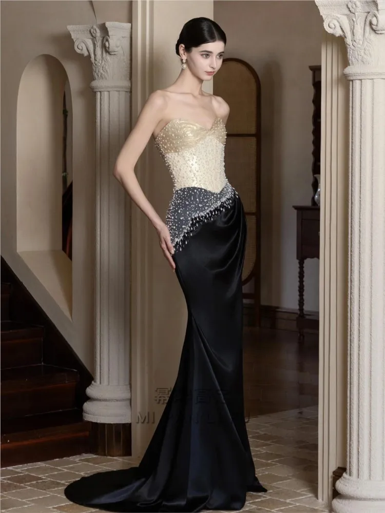

High-end custom-made new strapless dress for banquets featuring a fishtail toasting style the host