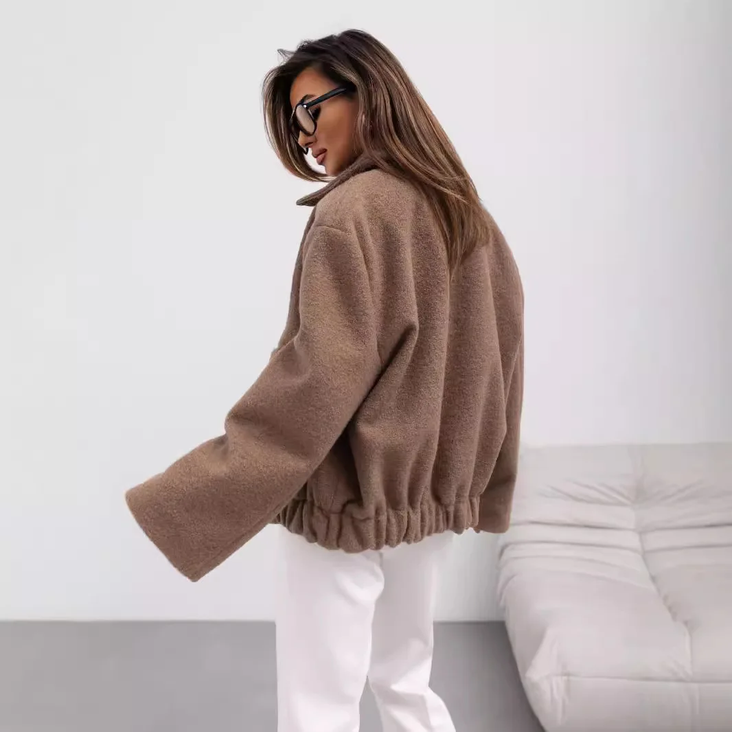 2025 nouvelle mode bouton tricoté revers veste femmes hiver décontracté ample couleur unie poche à manches longues veste femmes