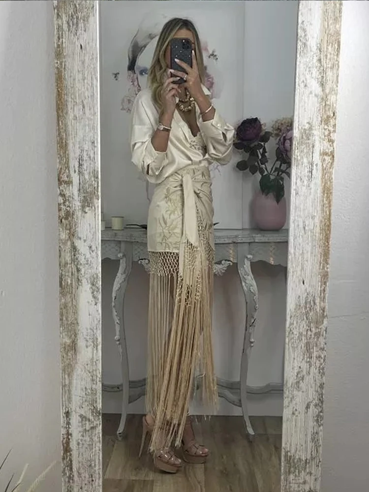 موضة شرابة المنسوجة ميدي تنورة المرأة أنيقة غير المتماثلة التجاعيد حزام أسفل 2025 جديد الصيف عطلة الشارع الشاطئ ملابس للسيدات