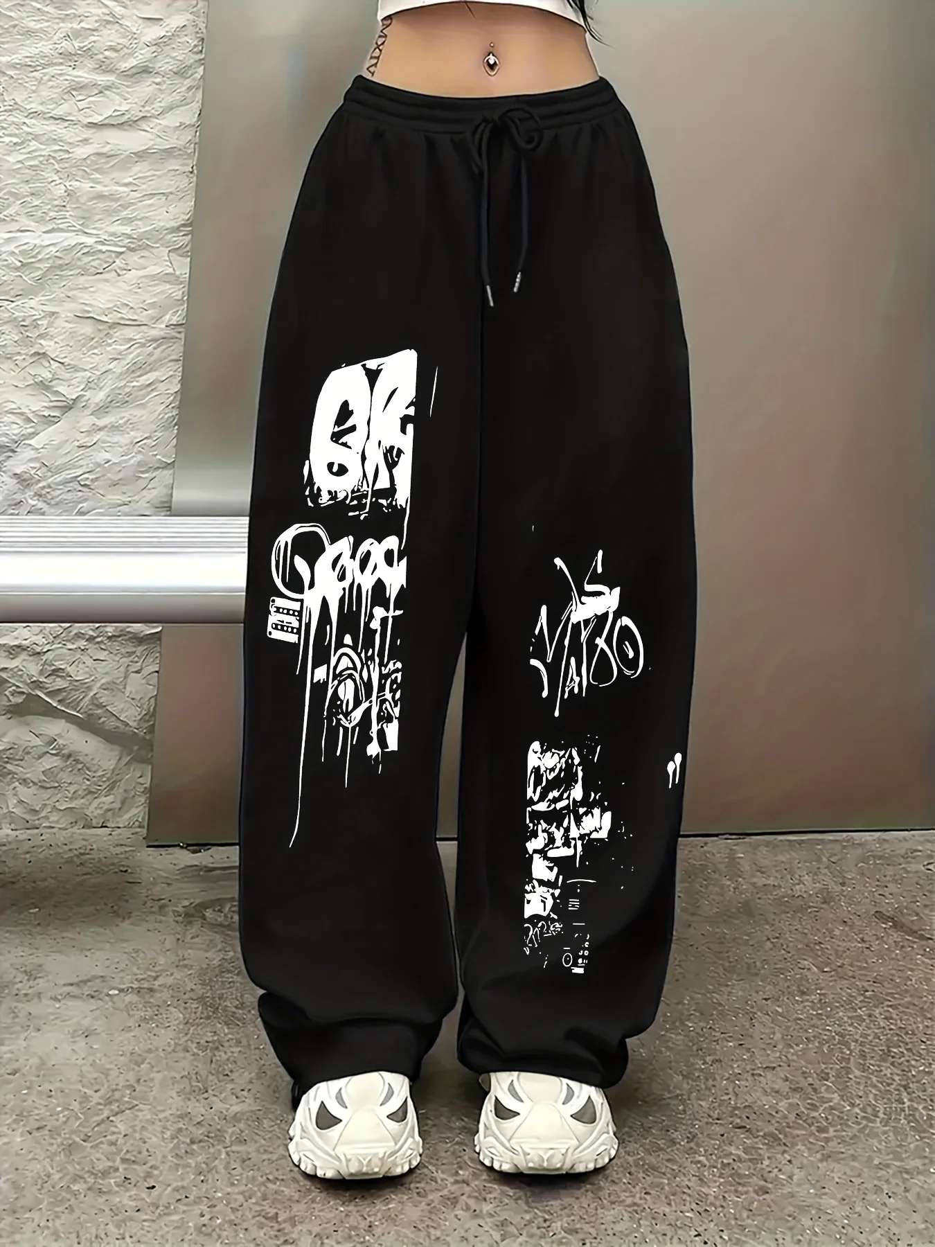 

Повседневные и модные спортивные брюки с принтом граффити, свободные брюки с узкой талией для мужчин и женщин.