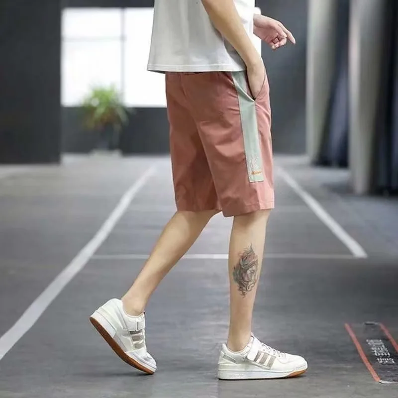 

Летние мужские баскетбольные шорты, тонкие и разноцветные варианты, новые быстросохнущие брюки из ледяного шелка, свободные и повседневные укороченные брюки.