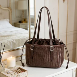 Retro Japanese and Korean style cowhide handmade hollow woven handbag female leather handbag soft light 2026 summer new