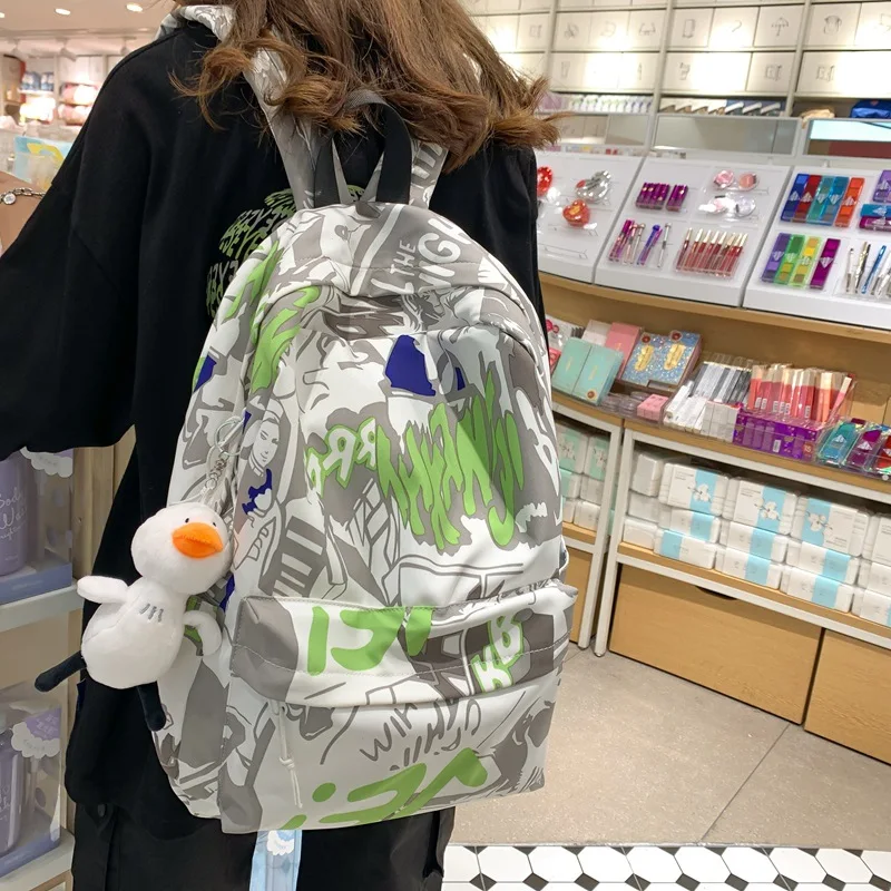 

Korean Nylon Shoulders Backpack Fashion Personality Graffiti Couple Backpack Large Capacity School Backpack for College Students