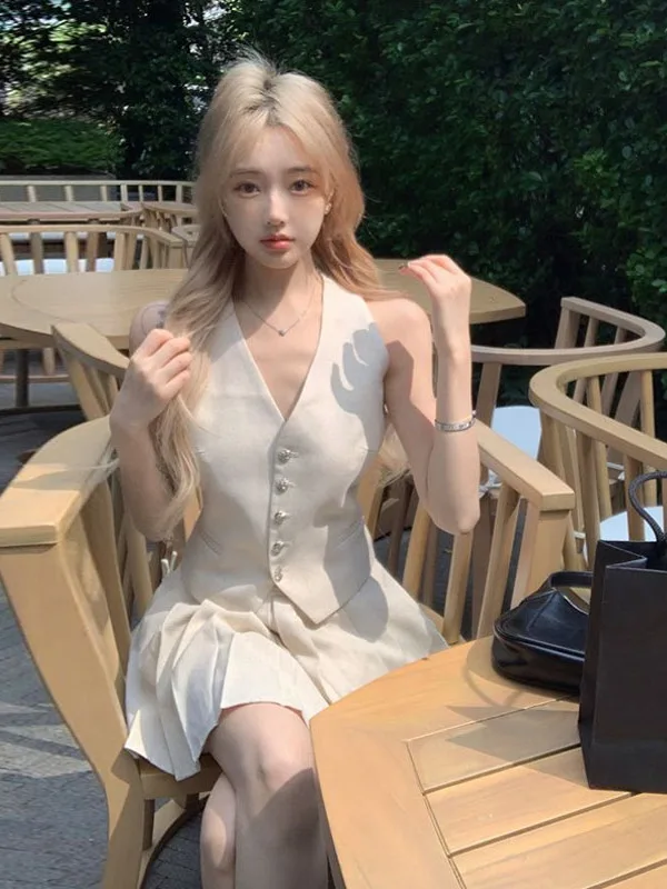 

Chic Summer Two-Piece Set with Belted Sleeveless Vest And Half-Length Pleated Skirt for Women in Light And Breathable Materials