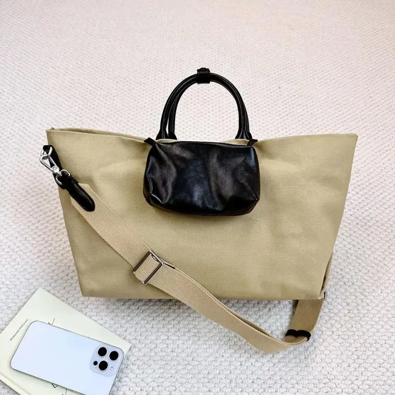 Lente en zomer stijlvolle canvas leer gesneden kantelbare kruishandtas designer luxe forensstrand Bagot reistas met grote capaciteit