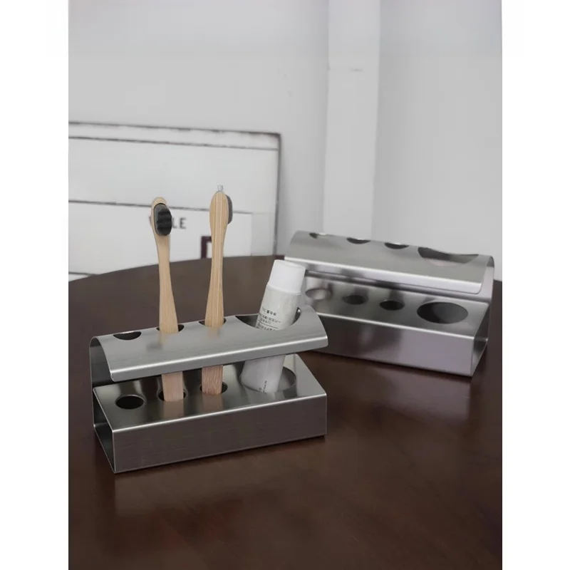 

Minimalist Stainless Steel Toothbrush Holder Bathroom Toilet Storage Rack No Drilling Cosmetic Toothpaste Organizer Shelf