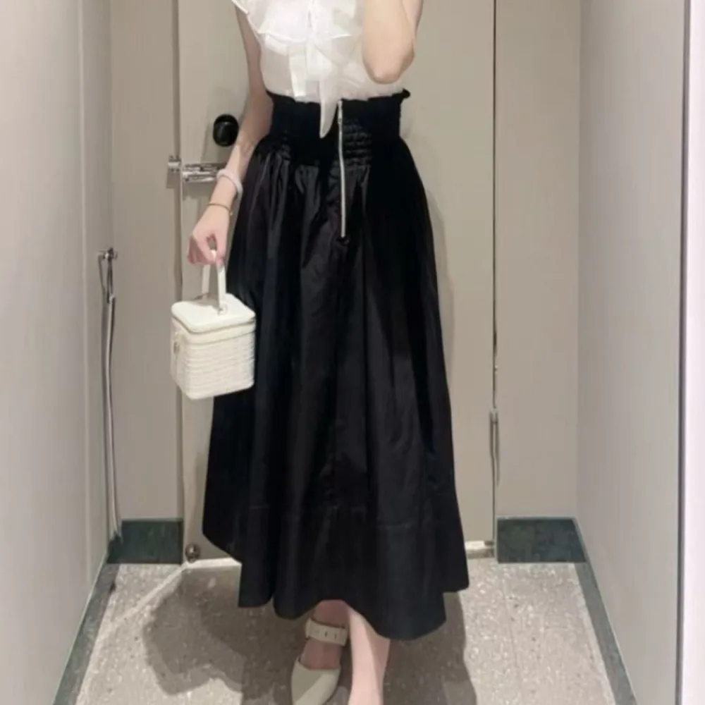 Elegancka spódnica midi w stylu japońskim, luksusowa, uniwersalna, z dużym zamachem, dla kobiet pracujących w biurze, miękka, premium, modna.