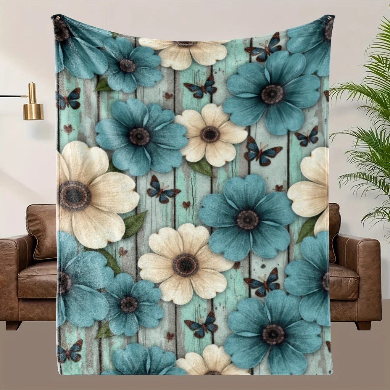 Blue-green and beige floral patterned blanket, polyester fabric, machine washable, suitable for your loving living room.