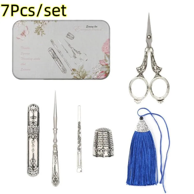 Image of 7-teiliges Retro-Scherenset mit Nadelbehälter, Ahle, Fadenzieher, Fingerhut, Stickerei-Schere, Schneider-Schere und Nähzubehör