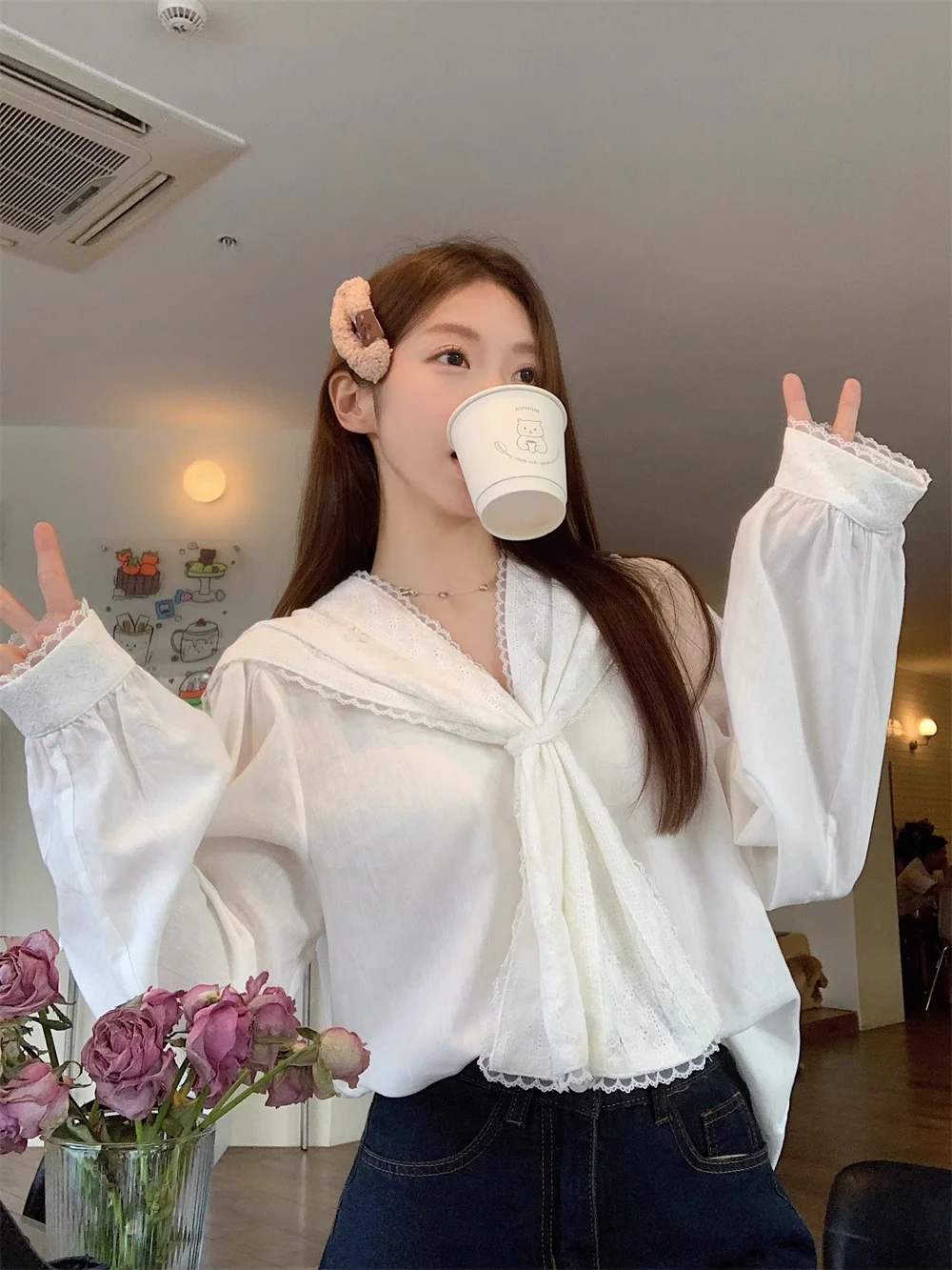 เสื้อเชิ้ตแขนยาวผู้หญิงลายทางทรงโอเวอร์ไซส์ติดกระดุมแขนทรงโคมจีบชายเสื้อสไตล์พรีปปี้ เรียบหรู สไตล์ฝรั่งเศสย้อนยุค