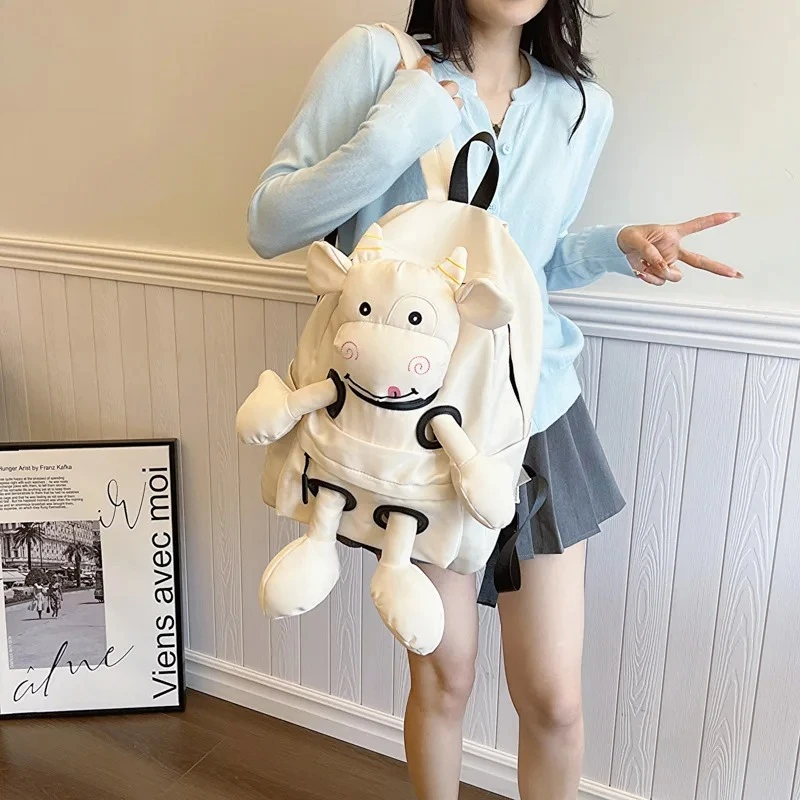 2026 New Women's Cute Cow Cartoon Plush Backpack | Large Capacity Student School Bag Casual Travel Fashion Daily Outing Bag