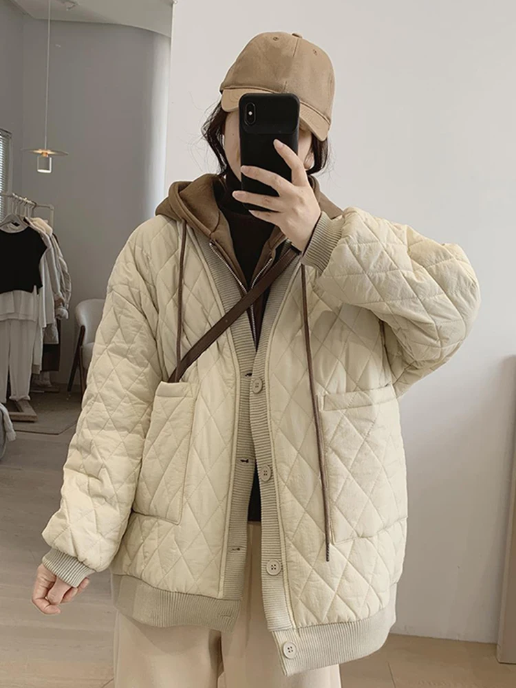 

Новая женская зимняя хлопковая куртка свободного кроя с капюшоном, корейская версия, для повседневной носки, с модным дизайном и легким утеплением