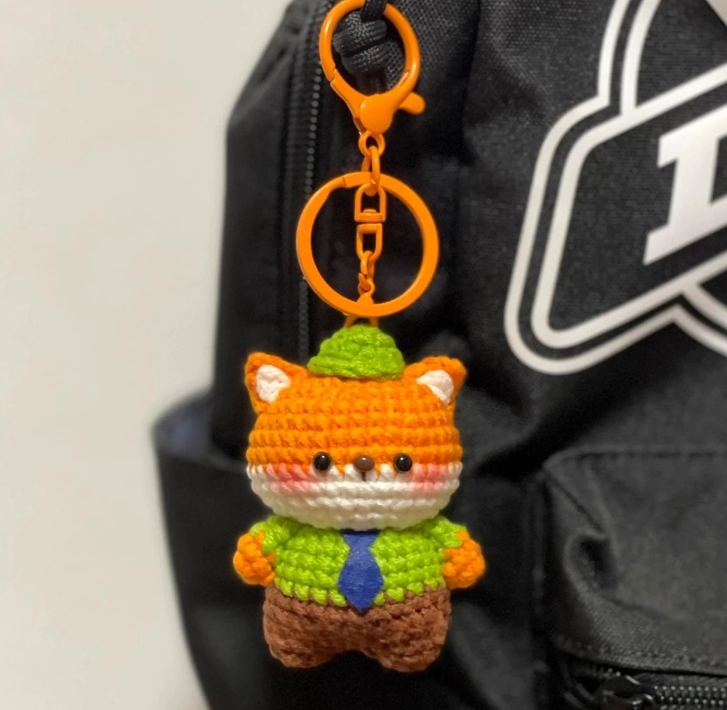 

DIY handmade crocheted bunny police officer doll pendant wool knitting material bag fox keychain creative gift