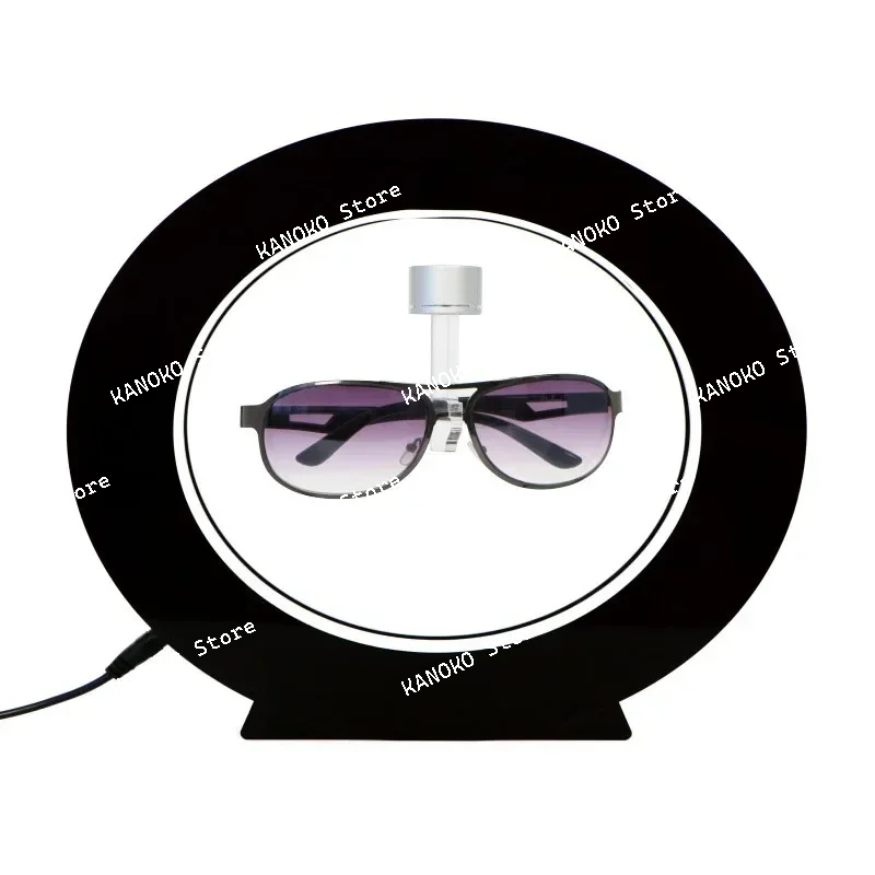 磁気浮上メガネディスプレイラック、楕円形、白く光る、自己回転メガネストア、クリエイティブ広告