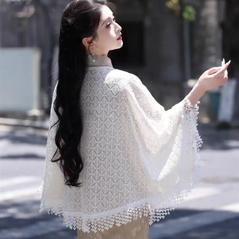 

Elegant Knitted Shawl Hollow out Tassel Cloak Women's Outerwear White New 2025 Spring Fashion Decorative Woolen