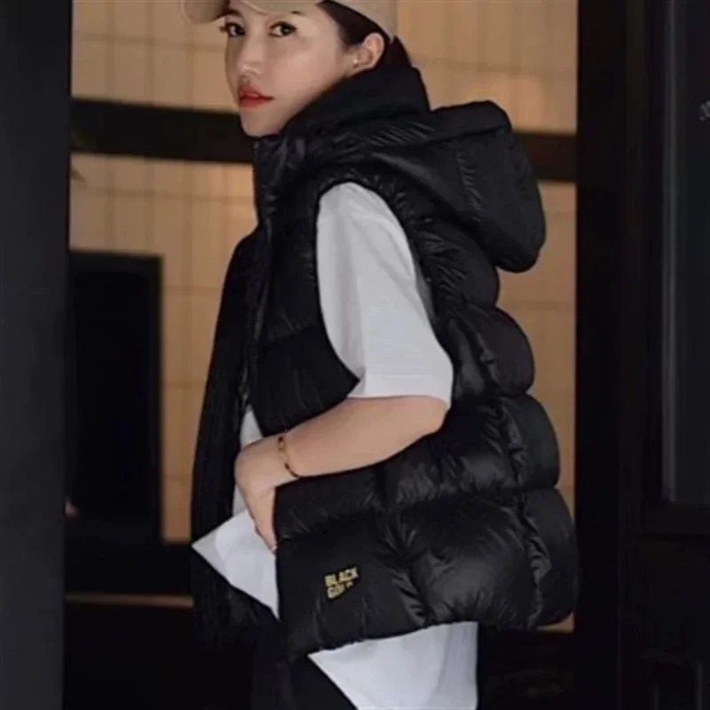 Damska kamizelka puchowa 2025, nowa, zimowa, gruba, ciepła, bez rękawów, czarna, dopasowana, modna, casualowa, wiatroodporna kamizelka.