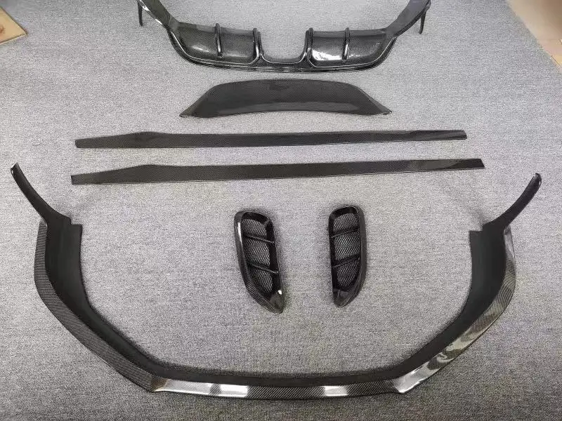 

Suitable forPorsc he 718 Kaman Boxster carbon fiber body kit, front lip, rear lip, hood, and rear wing