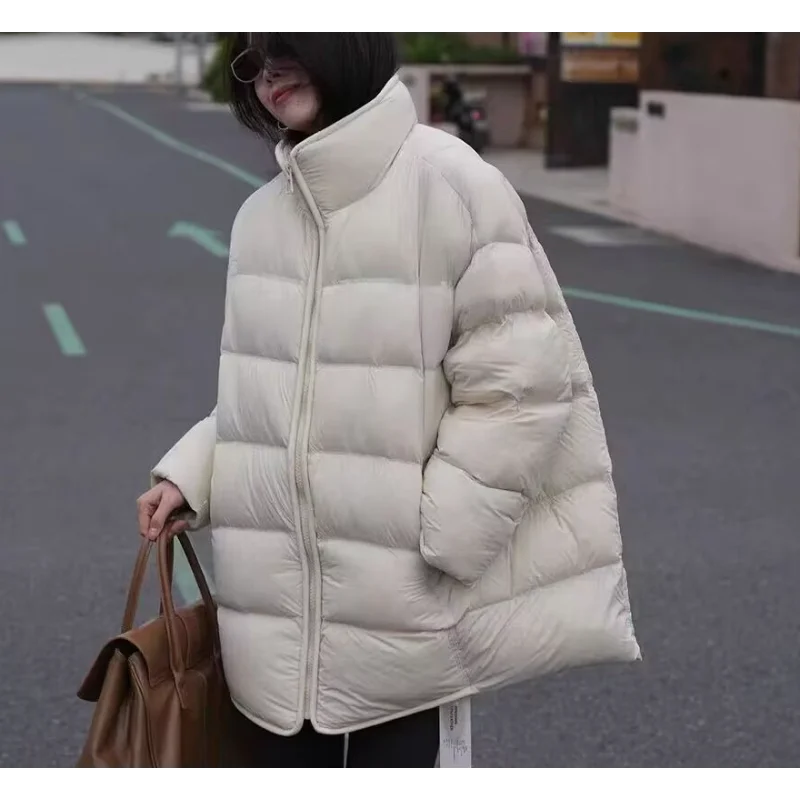 سترة نسائية شتوية متوسطة الطول مع غطاء للرأس - مقاس فضفاض، نمط شبابي، معطف طويل كاجوال كبير الحجم دافئ وعصري