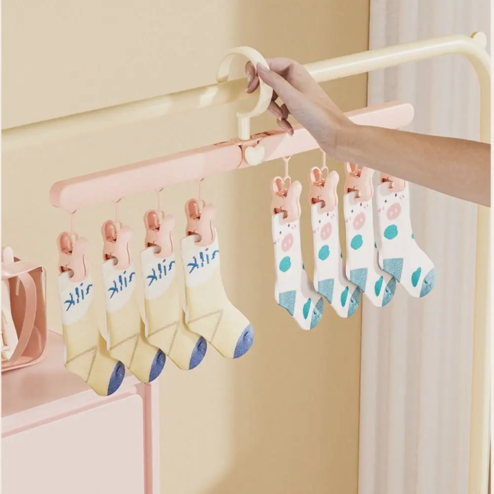 

Портативная складная сушилка, бесследная нескользящая вешалка для белья, прочные несущие зажимы для подвешивания носков с вращением на 360 градусов