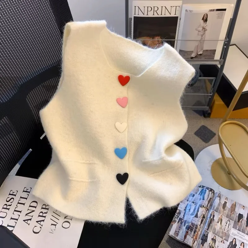 

Розовый вязаный жилет на пуговицах в форме сердца, женский ранний весенний жилет 202, новый многослойный жилет высокого класса с колючками, или длина, так...